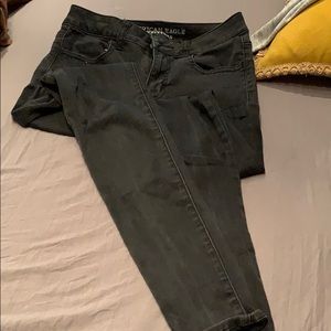 Distressed black jeggings/ jeans